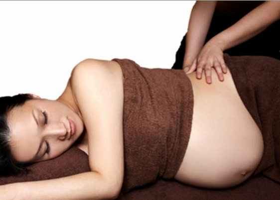 Who better deserves and needs good massage therapy than mommy to be massage! pregnant woman receiving massage