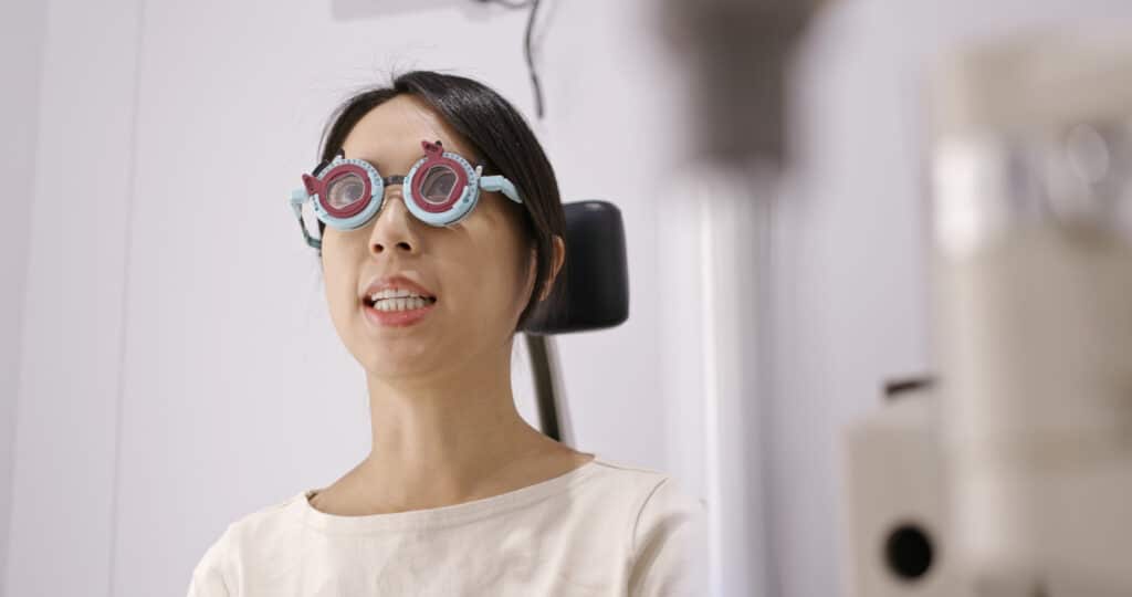 Woman check on eye in clinic